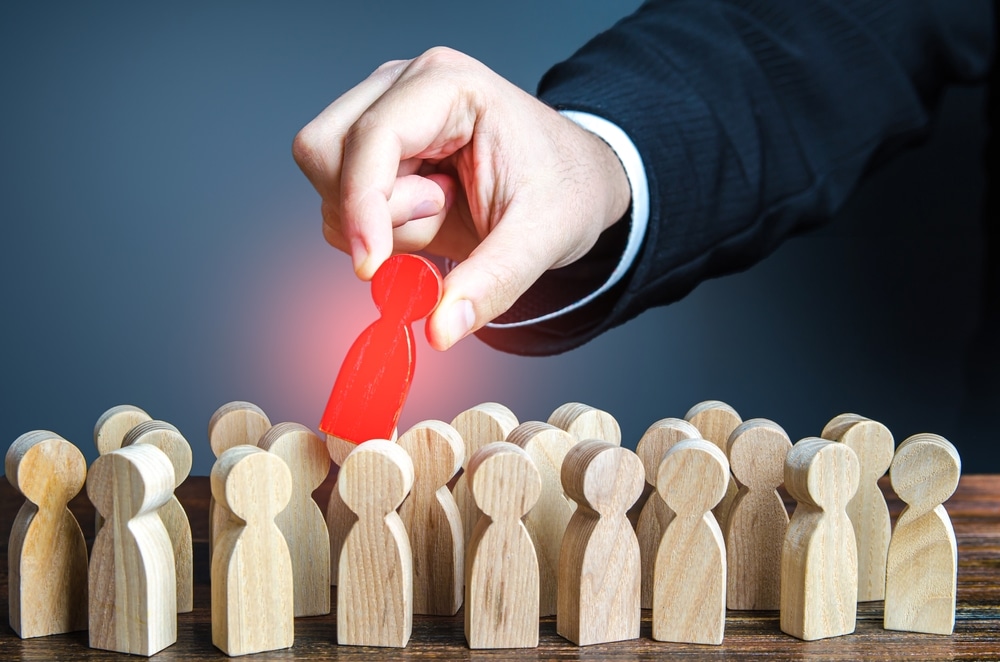 Hand,Pulls,Red,Man,Out,Of,Group.,Dismissal,,Weak,Link.